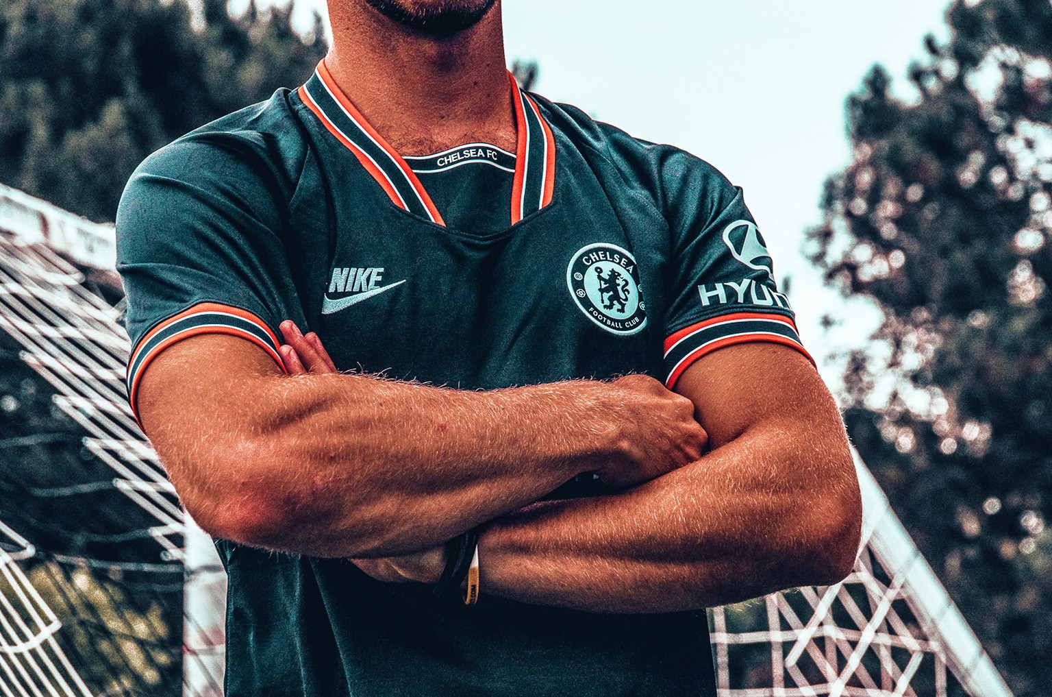KitLegit expert authenticator wearing Chelsea FC third shirt